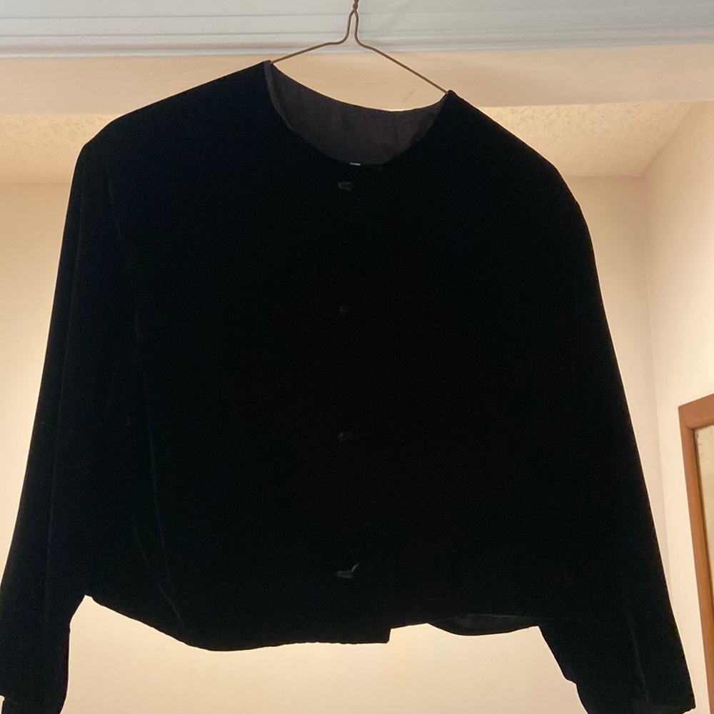 This is a short velvet bolero jacket four buttons velvet covered buttons.